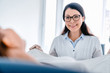 © InsideCreativeHouse - Female gynecologist working with patient in clinic