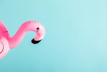 Summer Beach Composition. Pink Inflatable Mini Flamingo On Pastel Blue Background, Pool Float Party, Trendy Summer Concept. Flat Lay, Top View, Copy Space
