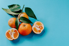 Fresh Organic Clementines With Leaves And With Copy Space