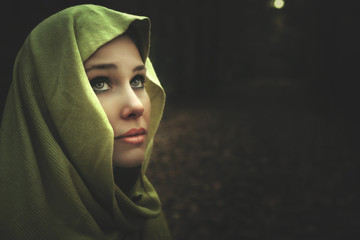 Dark night portrait of mysterious beautiful woman