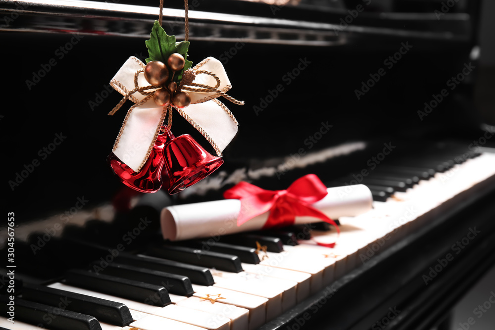 Piano with beautiful Christmas decor, closeup