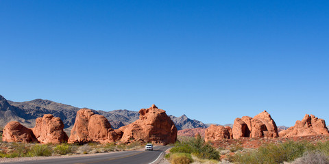 Canvas Print - Car on scenic drive through the 