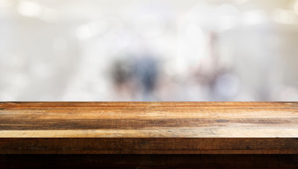 empty rustic wooden table with interior background