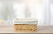 Straw Empty Basket With White Linen On Table.