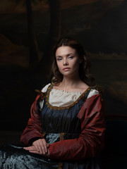 Portrait of a young woman in the style of a Renaissance painting.