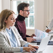 © LStockStudio - Business People Working