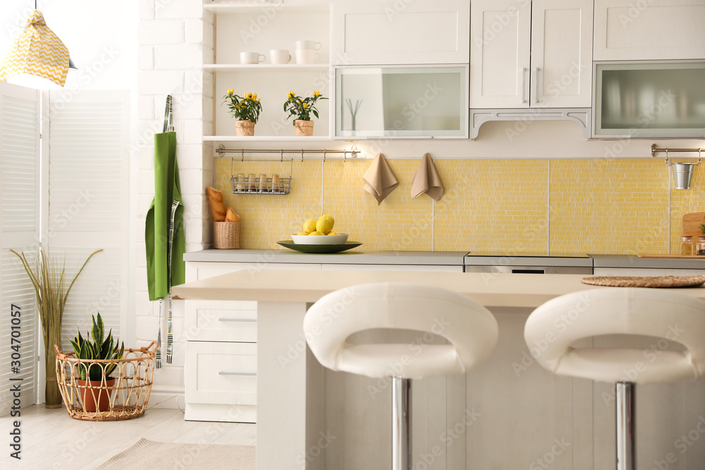 Modern kitchen interior with stylish white furniture - obrazy, fototapety, plakaty 