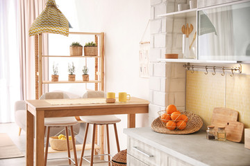 Poster - Modern kitchen interior with stylish wooden table