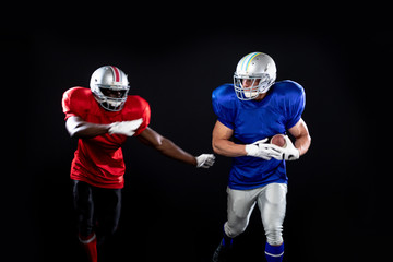 Wall Mural - Two American football players in action