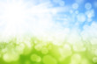 © oraziopuccio - Green and blue blurred summer background with shining sun and with Bokeh