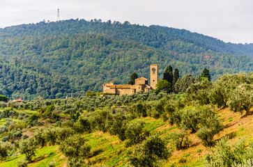 Wall Mural - View of Ss. Mary and Leonard parsih church in Artimino with typical tuscan landscape