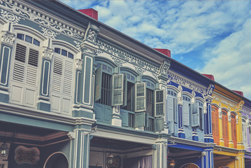 Wall Mural - View of the ancient unique windows of Georgetown, Malaysia. Beautiful houses exterior on a street. Historic architecture. Typical view of the street with colourful houses.