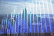 Forex graph on city view with skyscrapers background double exposure. Financial analysis concept.