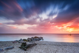 Fototapeta Niebo - Baltic sea beach during sunrise in Gdynia. Baltic Sea. Poland