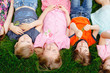 © Andrey - A group of happy children of boys and girls run in the Park on the grass on a Sunny summer day . The concept of ethnic friendship, peace, kindness, childhood