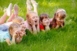 © Andrey - A group of happy children of boys and girls run in the Park on the grass on a Sunny summer day . The concept of ethnic friendship, peace, kindness, childhood
