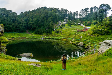 Wall Mural - a panoramic view of the serolsar lake, jalori pass, himachal pradesh, india