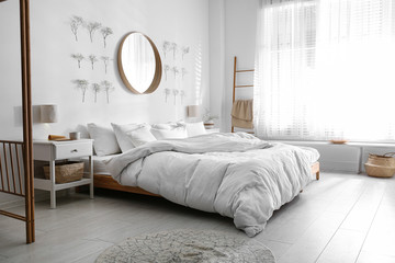 Poster - Modern bedroom interior with stylish round mirror