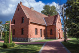 Fototapeta Miasto - Nativity of Blessed Virgin Mary Church in Glaznoty, small village in Masuria region of Poland