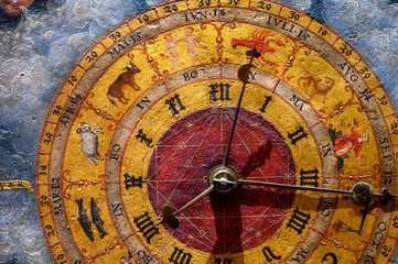 Wall Mural - an ancient clock with constellations	