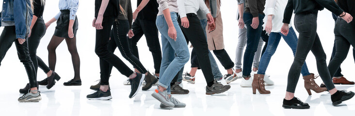 casual young people walking in different directions