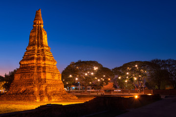 Beautiful ruins of ancient buddhist pagodas and stupas at historical park in night time which lights up beautifully.