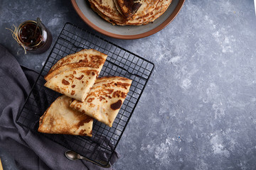 tasty homemade pancakes with berry jam served on gray stone table Top view Copy space