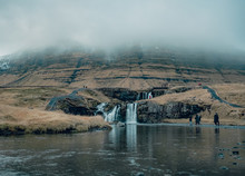 Kirkjufellsfoss Waterfall Next To Mount Kirkjufell In Iceland
