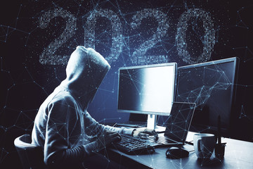 young hacker using computer