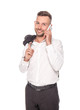© Igor - smiling businessman talking on smartphone while holding jacket isolated on white