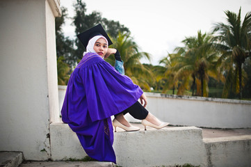 A beautiful Malay girl celebrating her graduation day.