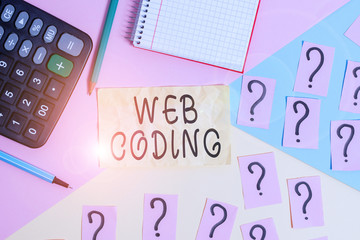 writing note showing web coding. business concept for work involved in developing a web site for the