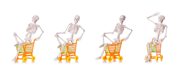 Wall Mural - Skeleton with shopping cart trolley isolated on white
