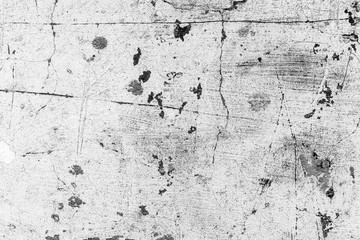 Texture of a concrete wall with cracks and scratches which can be used as a background