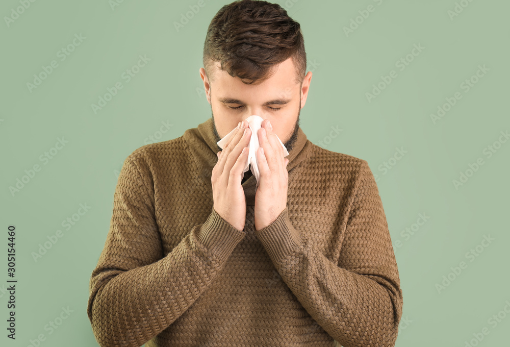Portrait of sick man on color background