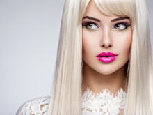 Beautiful  Woman With Long White Straight  Hairs And Bright Make-up