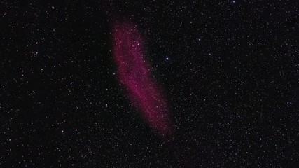 Wall Mural - zoom-in on a deep red nebula in space