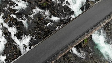 Sticker - Aerial view. Norwegian landscape. Waterfall Latefossen with stone arched bridge road, Odda Hordaland County in Norway. National tourist Hardanger road 13