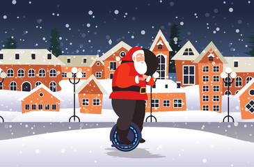 Wall Mural - santa claus riding self balancing mono wheel personal electrical transport merry christmas happy new year winter holidays celebration concept snowy cityscape background horizontal vector illustration