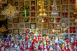 © jokuephotography - Variety of tiny Christmas figures and Christmas baubles in a market stand on a German Christmas market
