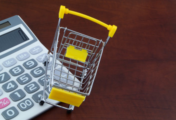 Smart shopping concept, shopping cart and calculator with room for text