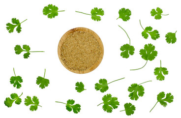 Wall Mural - The leaves and seeds of coriander isolated on white, top view