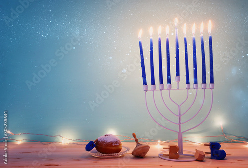 Religion Image Of Jewish Holiday Hanukkah Background With Menorah Traditional Candelabra Spinning Top And Doughnut Buy This Stock Photo And Explore Similar Images At Adobe Stock Adobe Stock