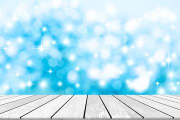 Wall Mural - abstract blur soft focus bokeh bulbs light in blue color background with star glittering and white w