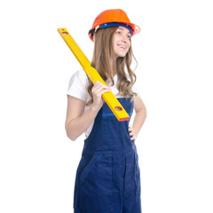 Wall Mural - Woman builder with work helmet holding building level on white background isolation