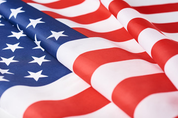 Close up of waving national usa american flag as a background. Concept of Memorial or Independence Day or 4th of July