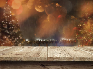 Wall Mural - Wooden desk on bokeh blur abstract christmas background