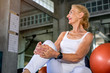 © Suthiporn - Senior woman Caucasian smiling and happy at fitness gym.