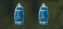 Top Down Aerial View Of Two Blue Rowing Boats On A Water Background