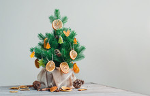Dried Citrus Carved Slices On The Christmas Tree As Natural Decorations